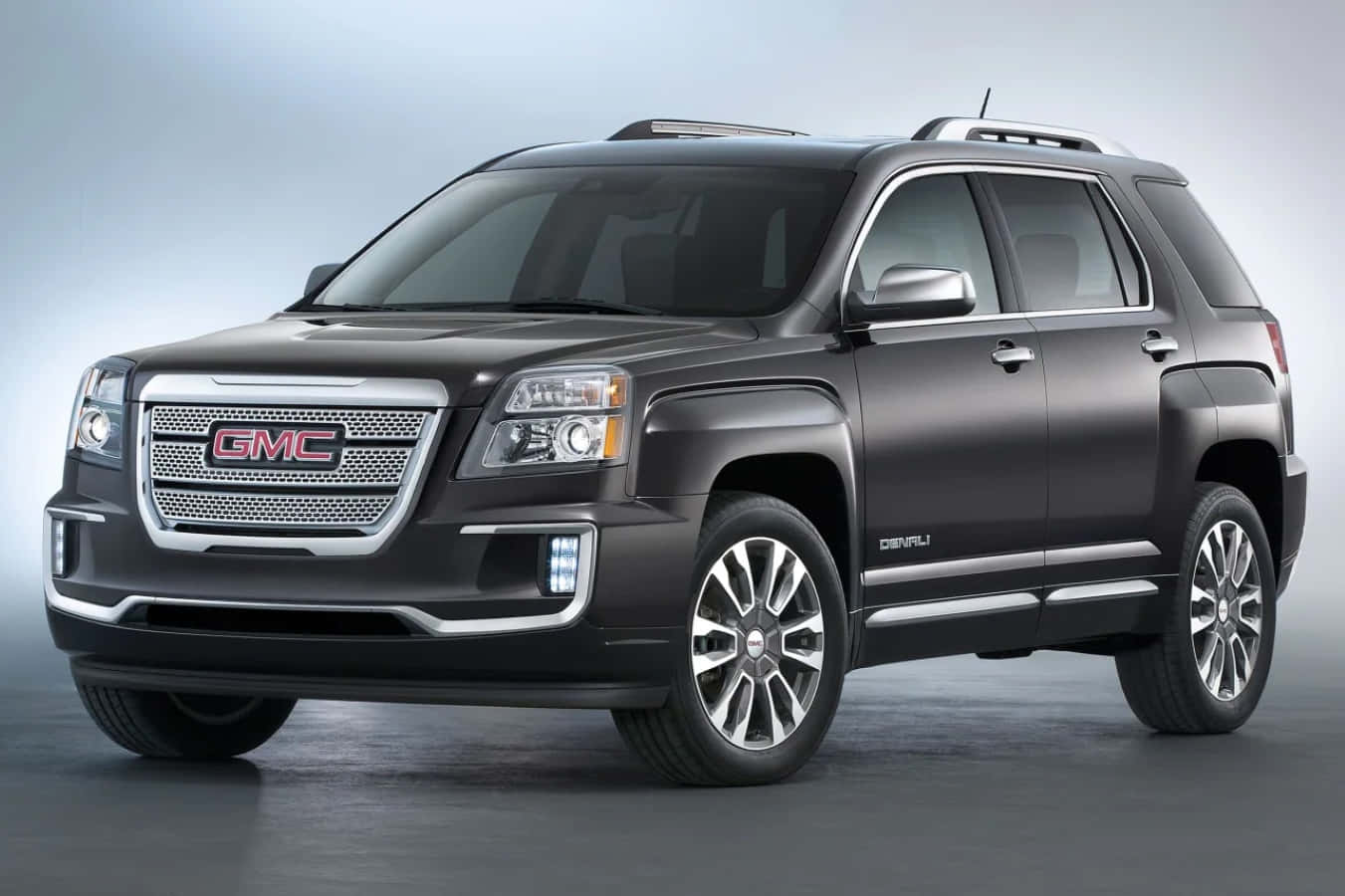 Gmc Terrain On A Scenic Mountain Road Wallpaper