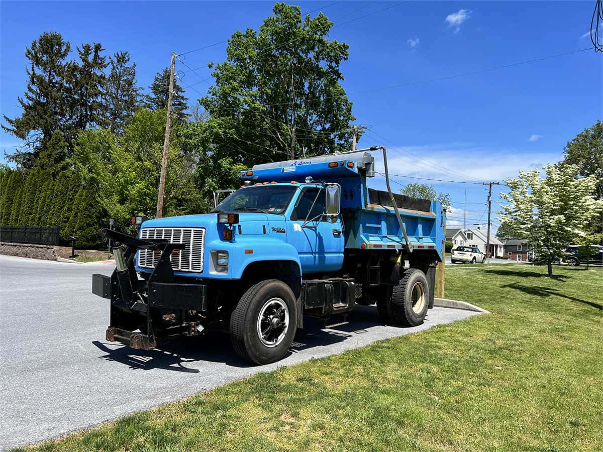 Gmc Topkick Truck On Highway Wallpaper