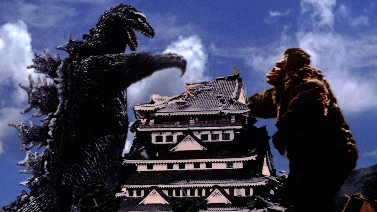 Godzilla And Kong Clash In The Streets Of Japan Wallpaper