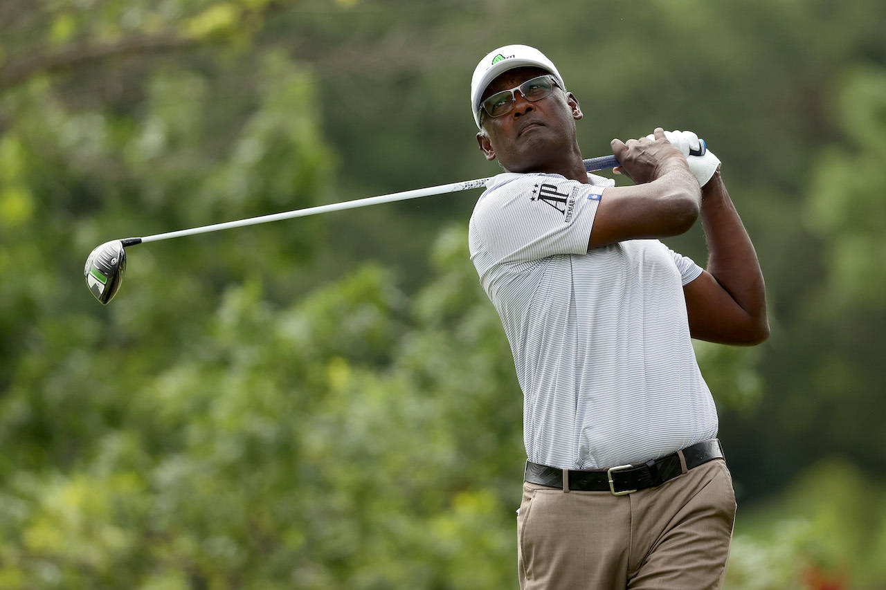 Golf Legend, Vijay Singh, Captured In A Gray Shirt Wallpaper