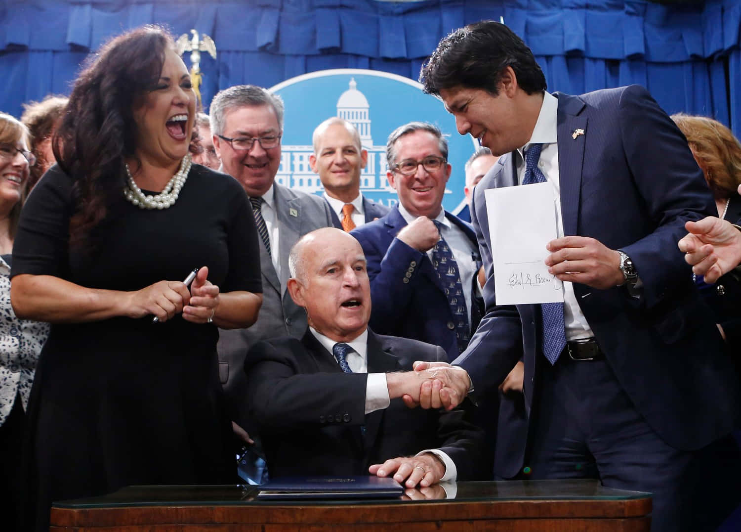 Governor Jerry Brown Shaking Hands With Supporters Wallpaper