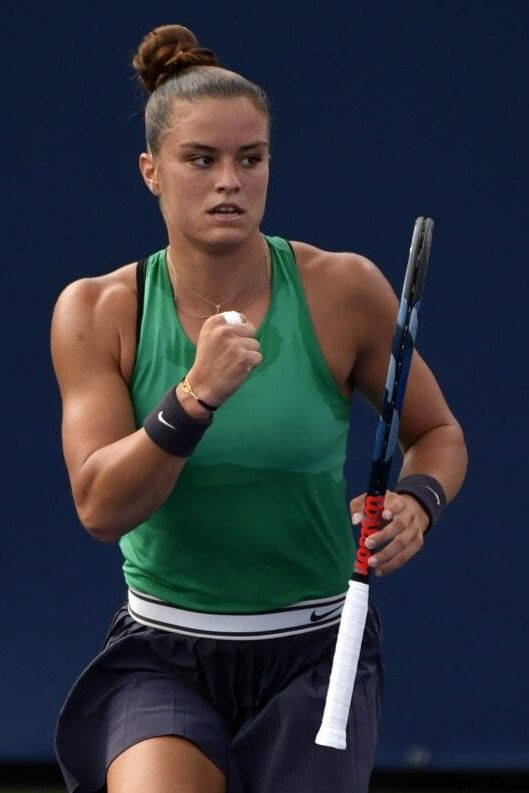 Grand Slam Talent Maria Sakkari Showcasing Her Professional Tennis Skills At The Hard Court. Wallpaper