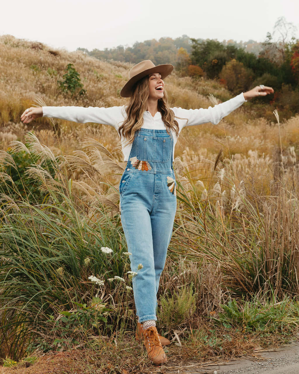 Granola Girl Joy In Autumn Fields.jpg Wallpaper