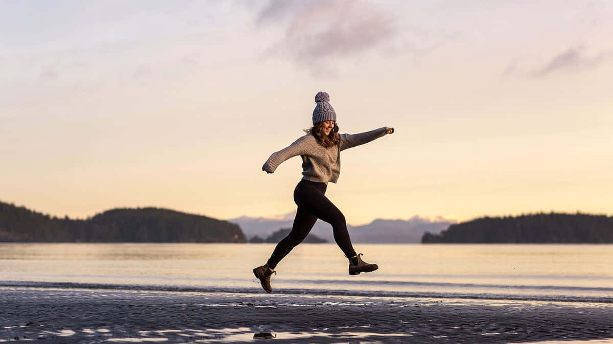 Granola Girl Joyful Beach Run.jpg Wallpaper