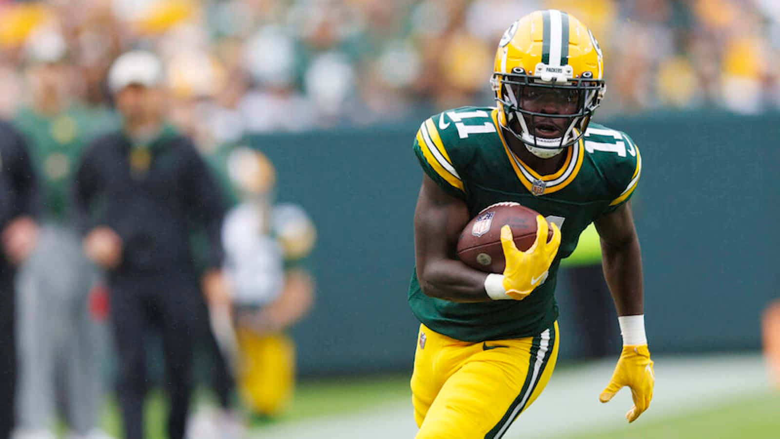 Green Bay Packers Player Running With Football Wallpaper