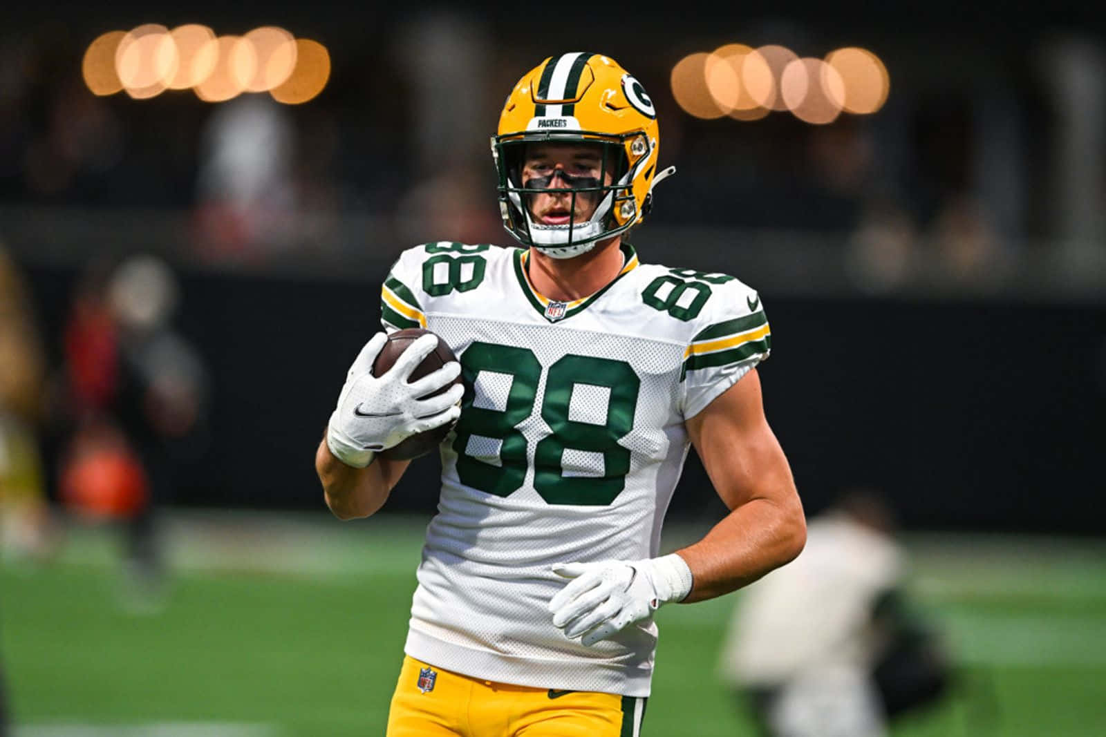 Green Bay Packers Player Running With Football Wallpaper