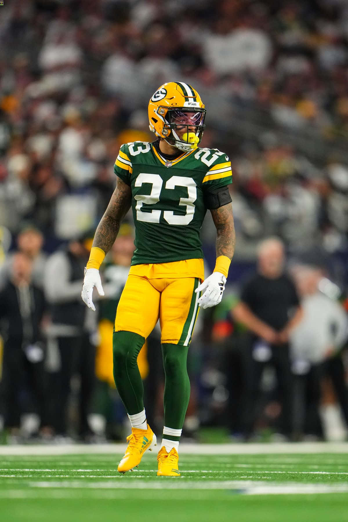 Green Bay Packers Player23 Standingon Field Wallpaper