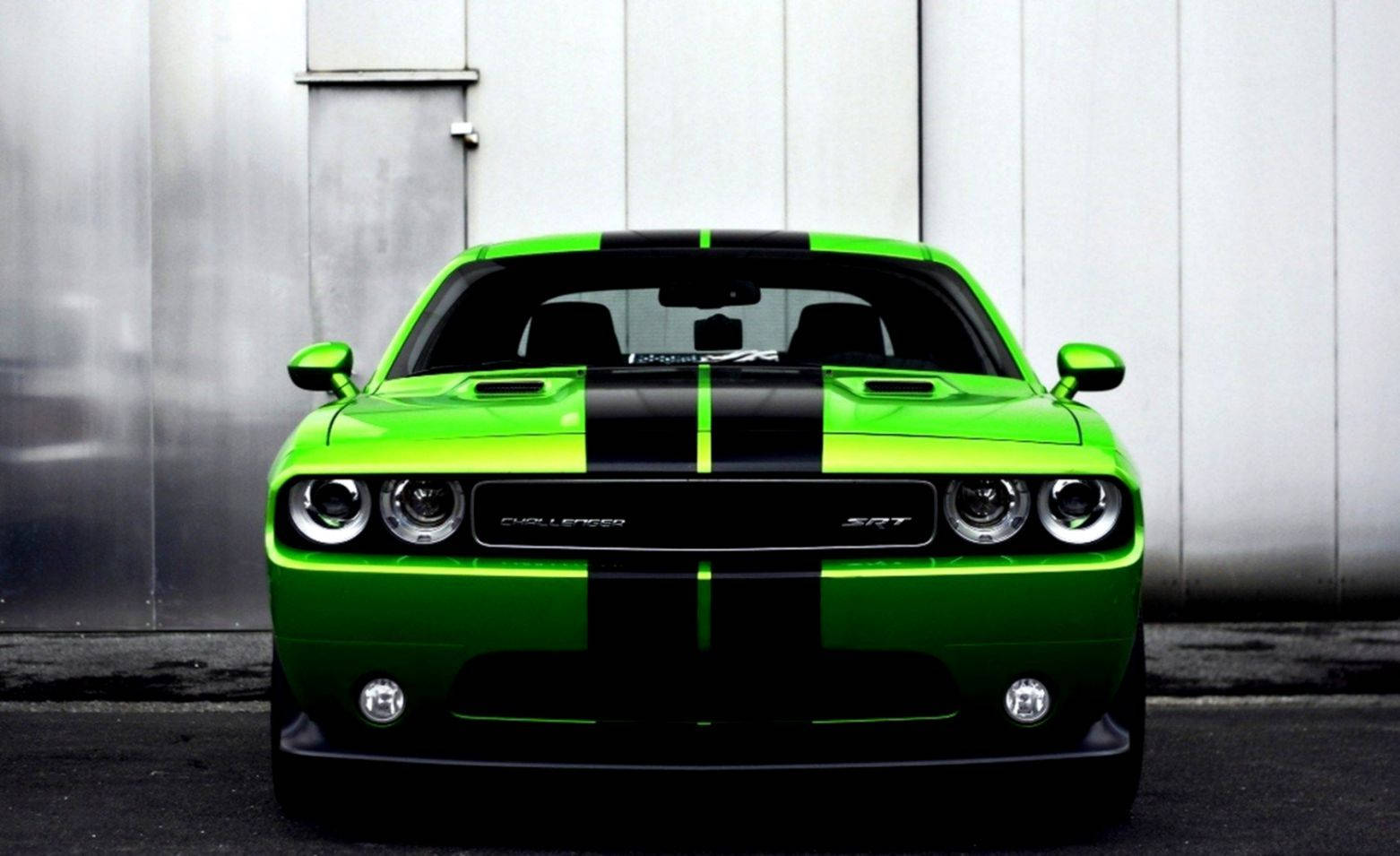 Green Dodge Challenger- Epitome Of Power And Style Wallpaper