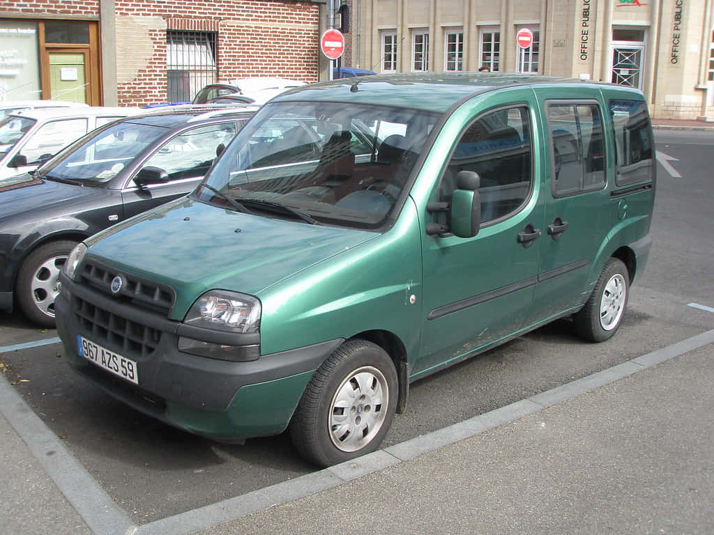 Green Fiat Doblo Parkedon Street Wallpaper