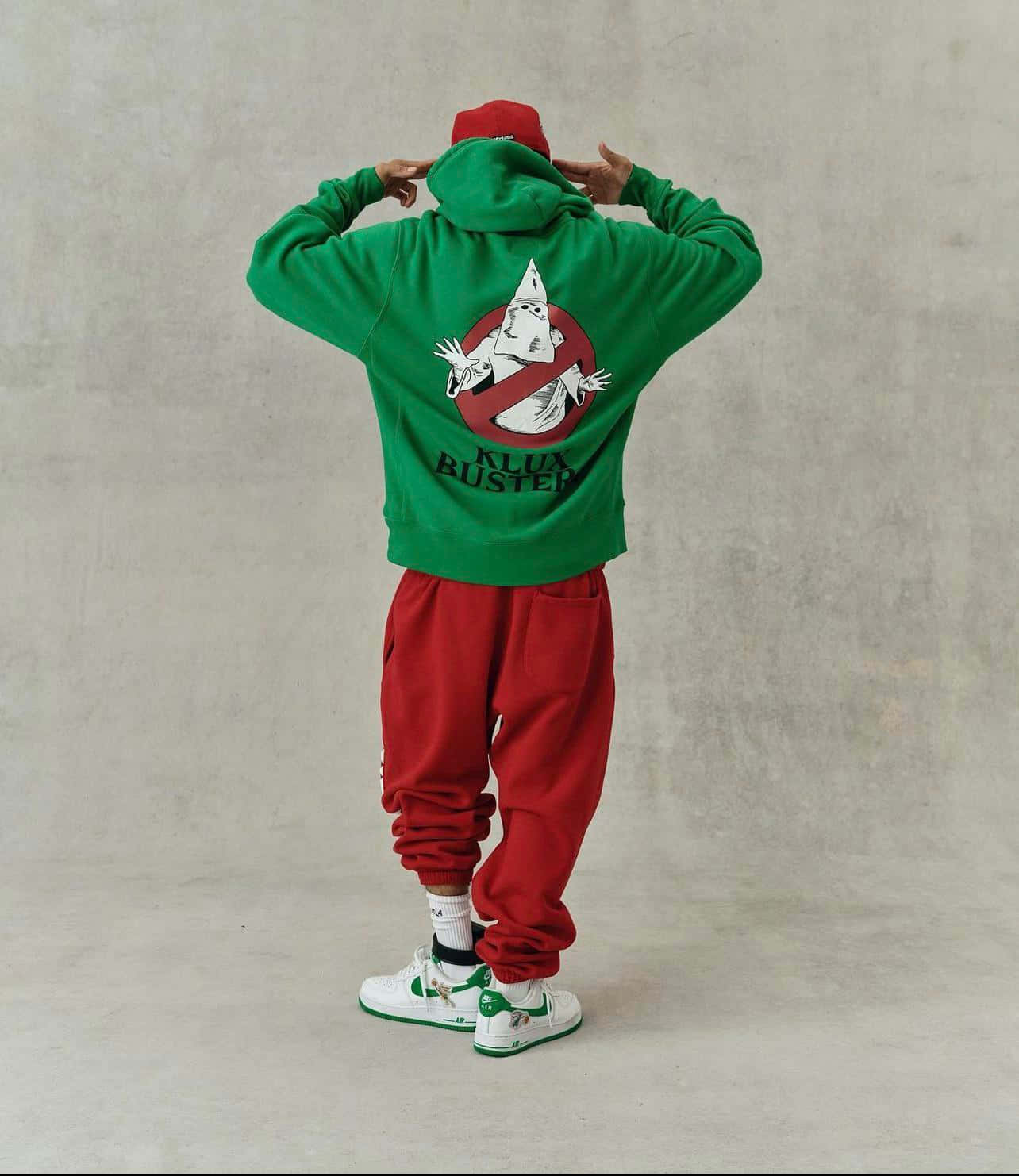 Green Hoodie Red Pants Fashion Pose Wallpaper