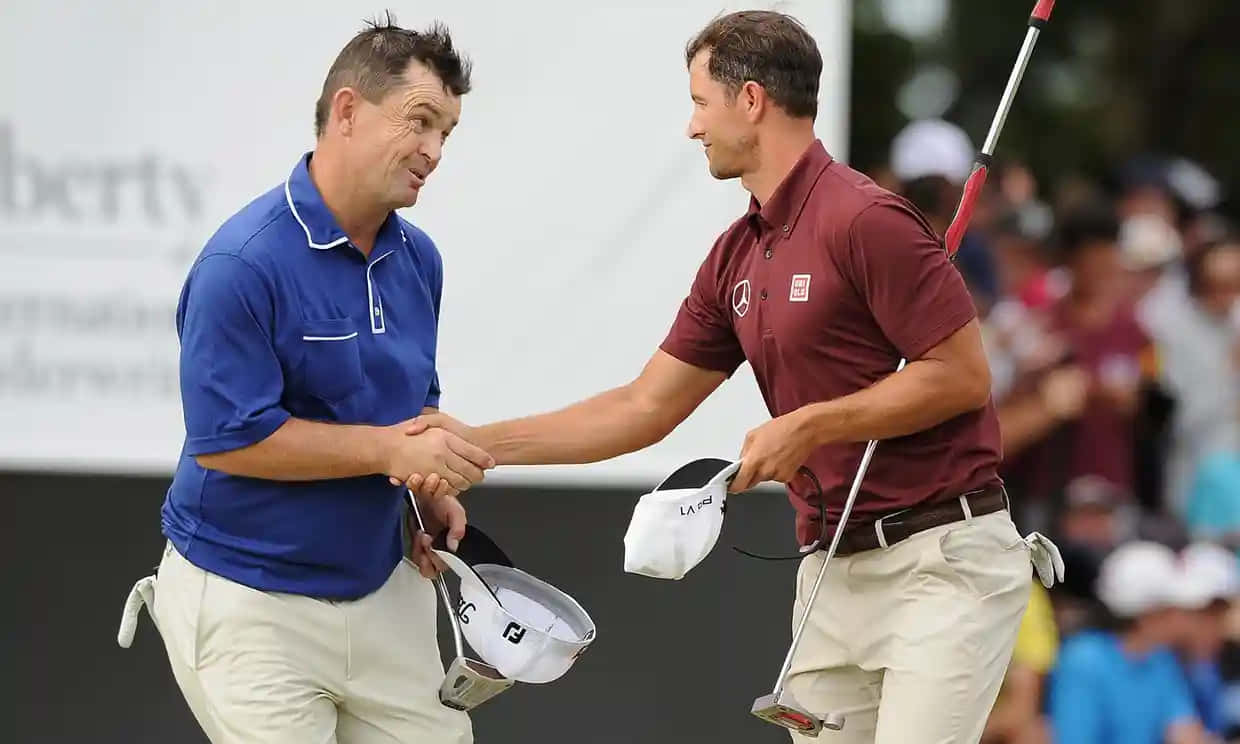 Greg Chalmers Shaking Hands With Adam Scott Wallpaper