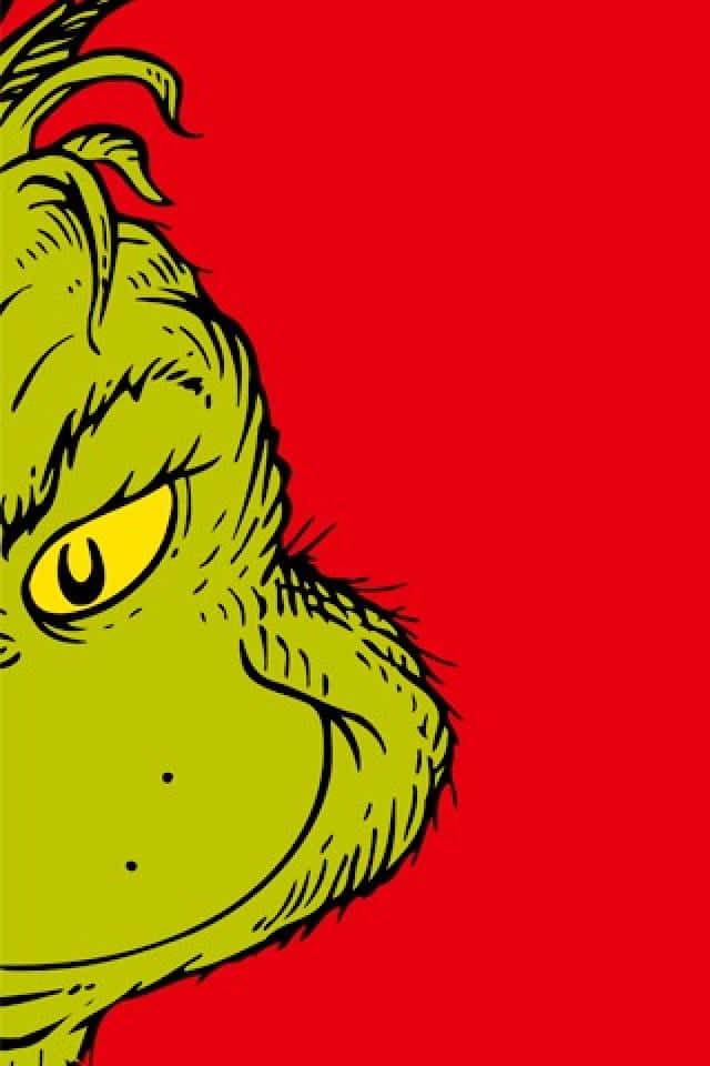 Grinch Side Glance Red Background Wallpaper