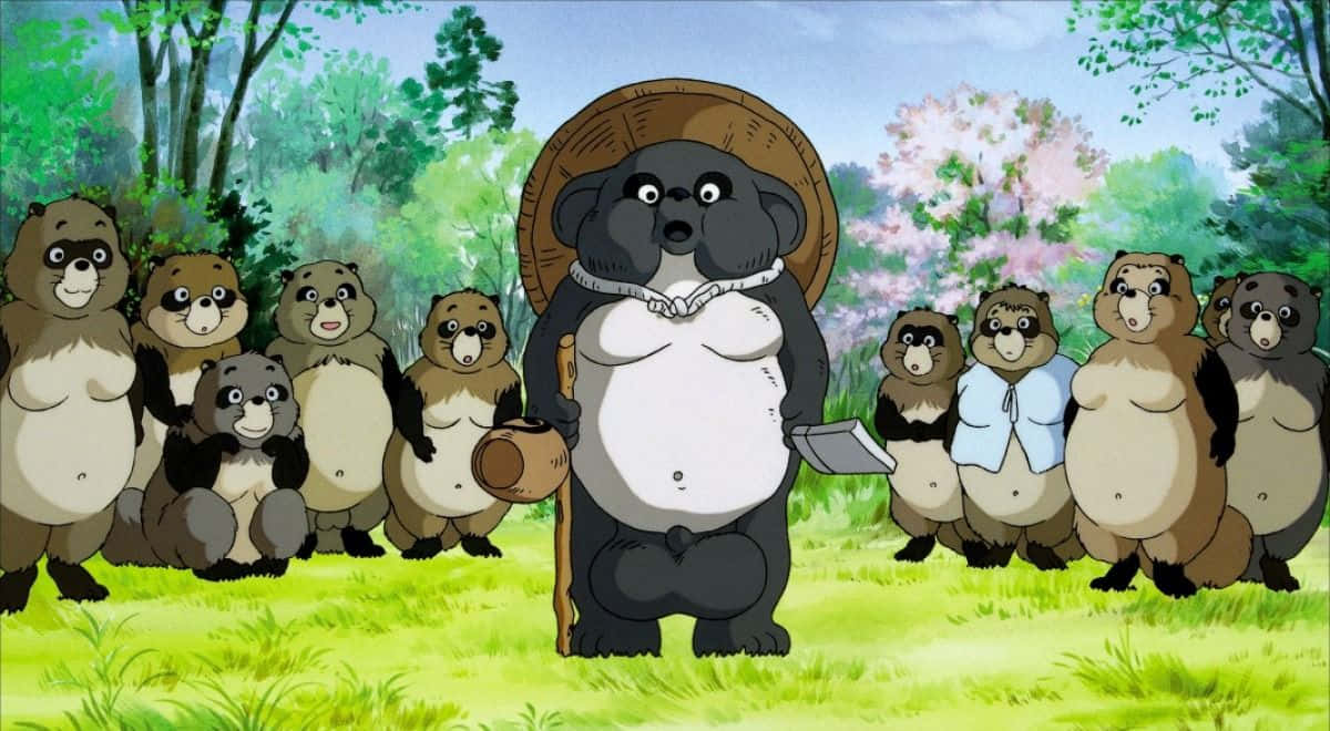 Group Of Tanuki From Pom Poko In A Fantasy Landscape Wallpaper