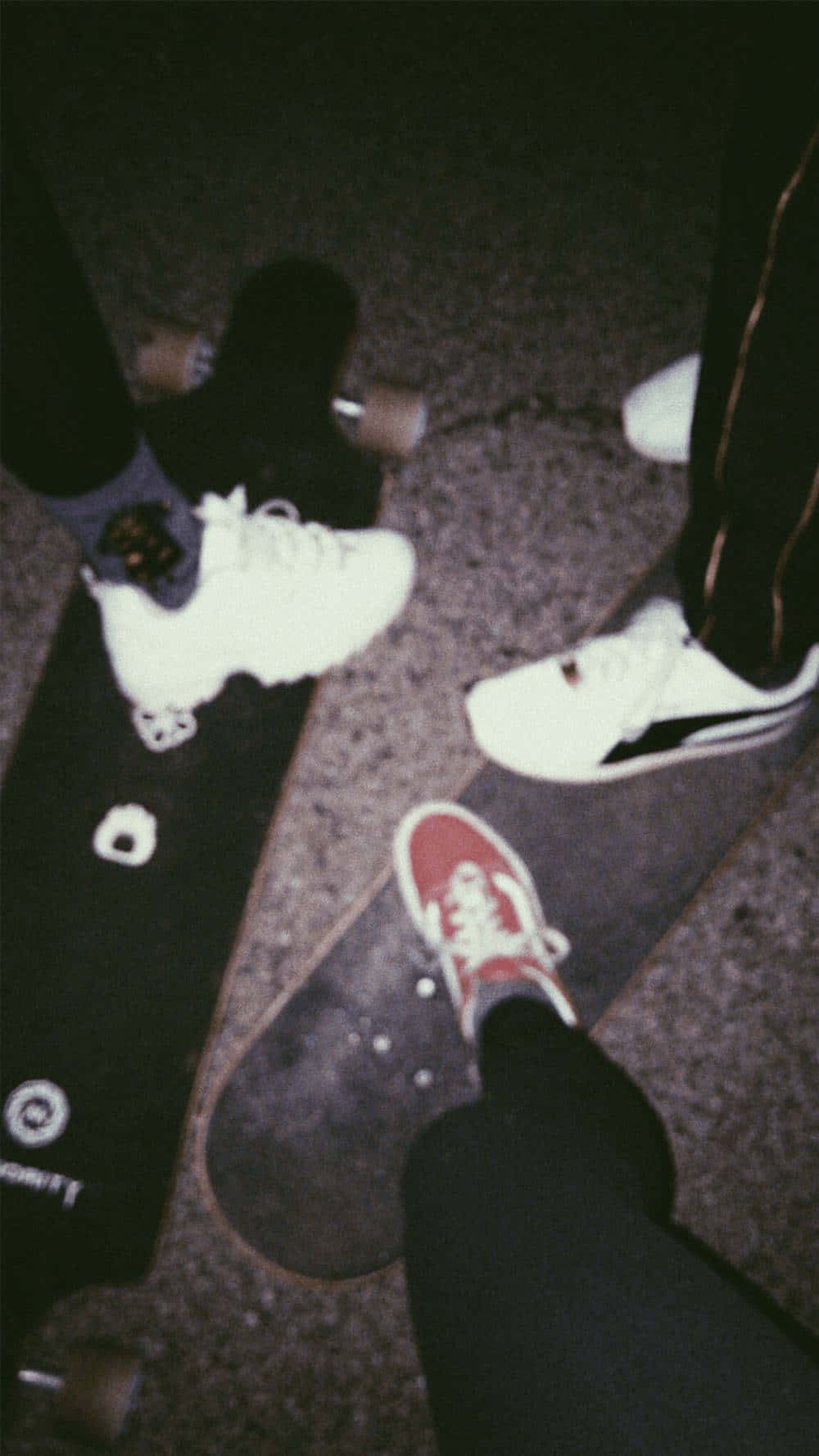 Grunge Skater Shoesand Skateboards Nighttime Wallpaper