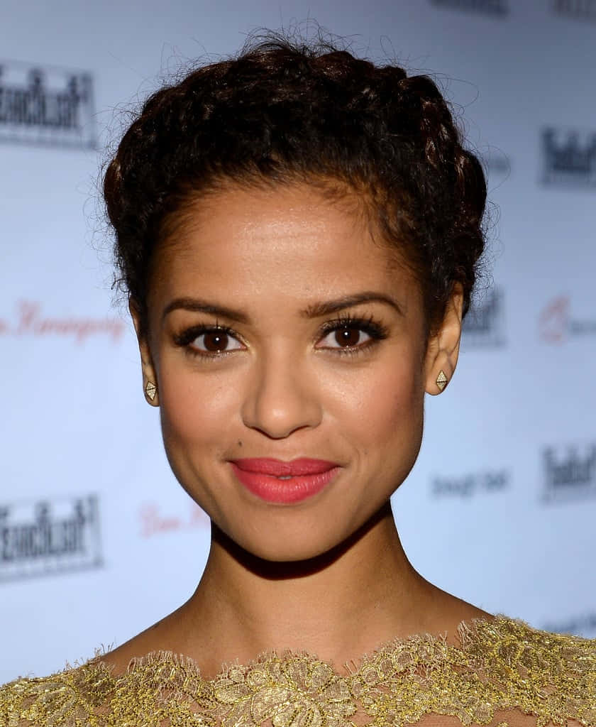 Gugu Mbatha-raw Smiling Elegantly In A Photoshoot Wallpaper