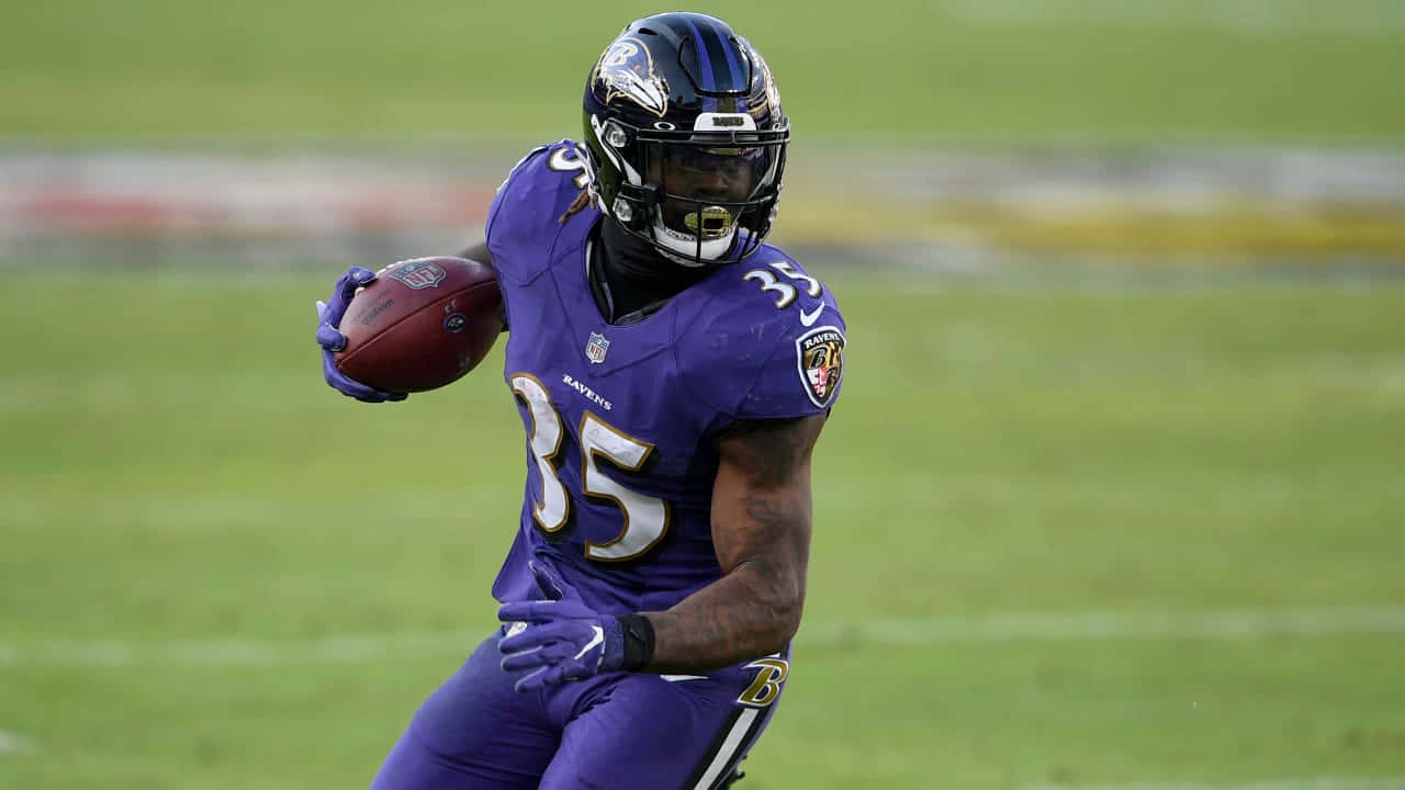 Gus Edwards Baltimore Ravens Running Back Wallpaper