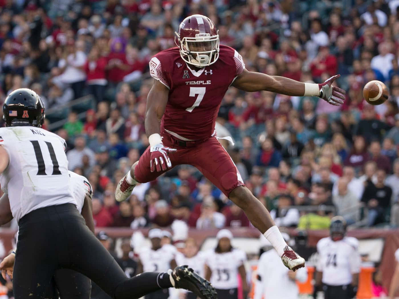 Haason Reddick Jumping Mid-air Wallpaper