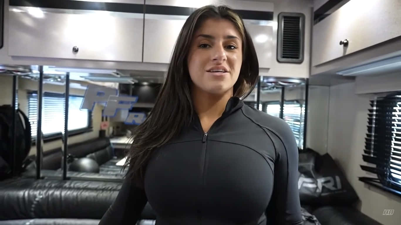 Hailie Deegan In Racing Trailer Wallpaper