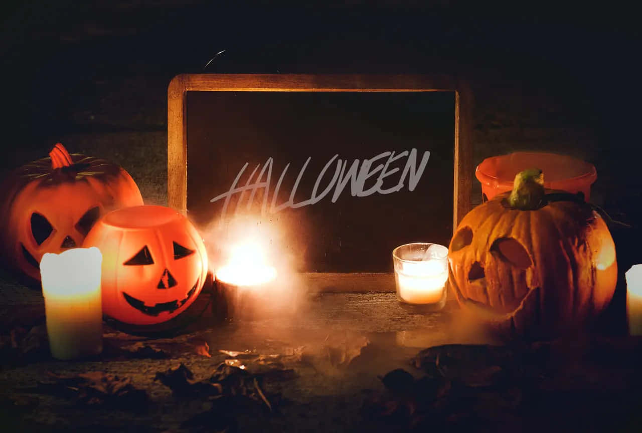 Halloween Pumpkinsand Candles Wallpaper