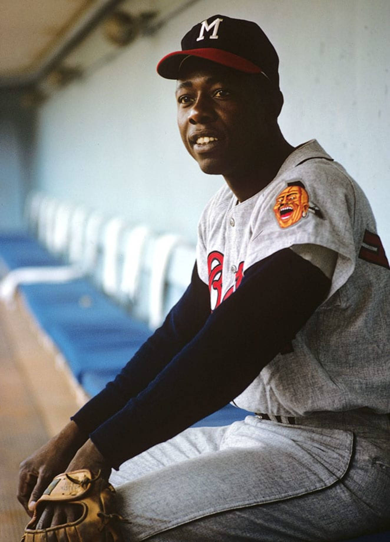 Hank Aaron Smiling In Dugout Wallpaper