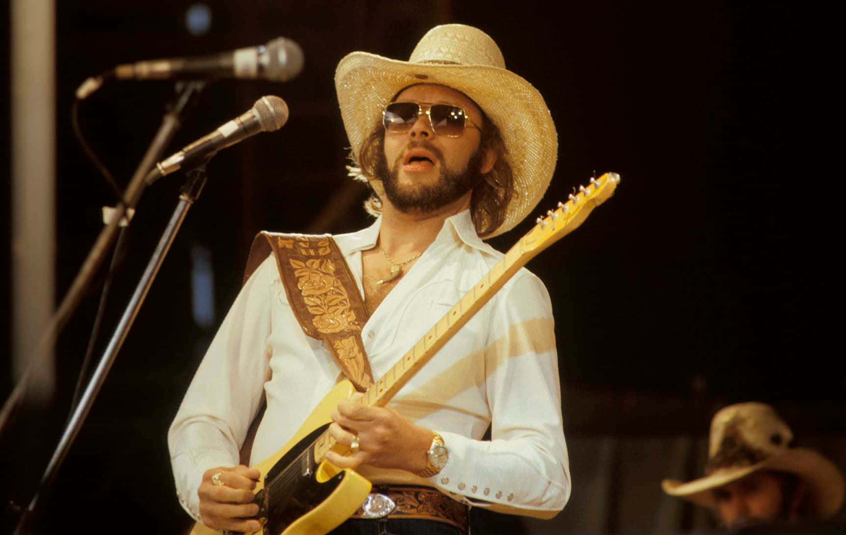 Hank Williams Jr. Performing At A Concert In Nashville, Tn Wallpaper