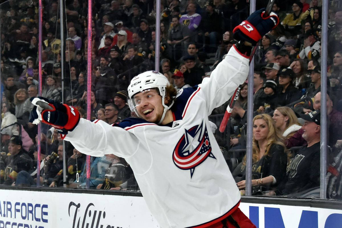 Happy Artemi Panarin Arms Up Wallpaper