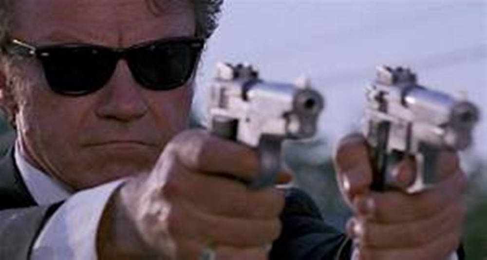 Harvey Keitel Holding Guns In Action Wallpaper