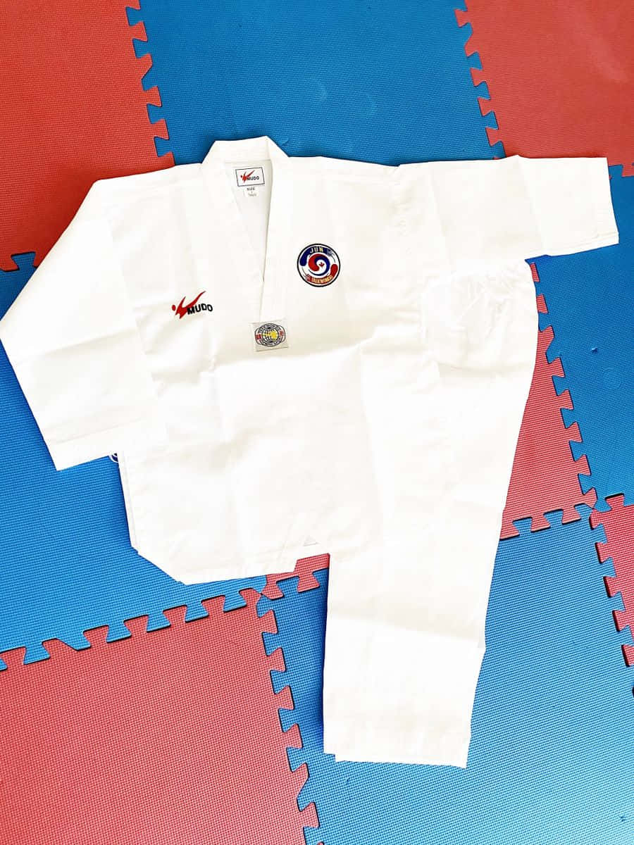 Have The Best Performance In Taekwondo With A Quality Uniform Wallpaper