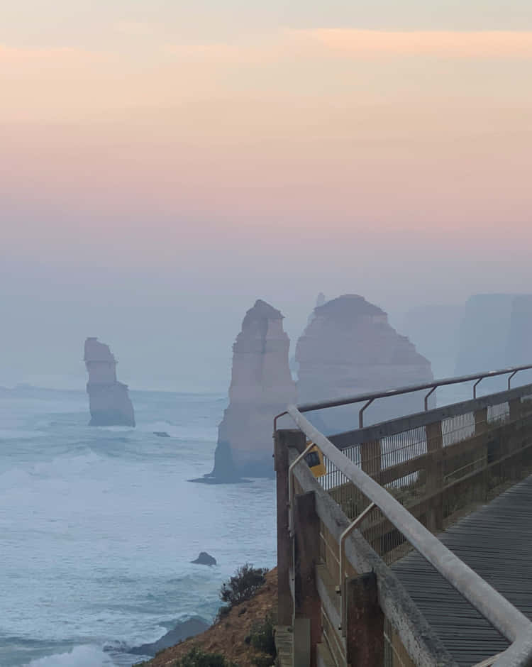 Hazy Great Ocean Road With Twelve Apostles In Australia Wallpaper