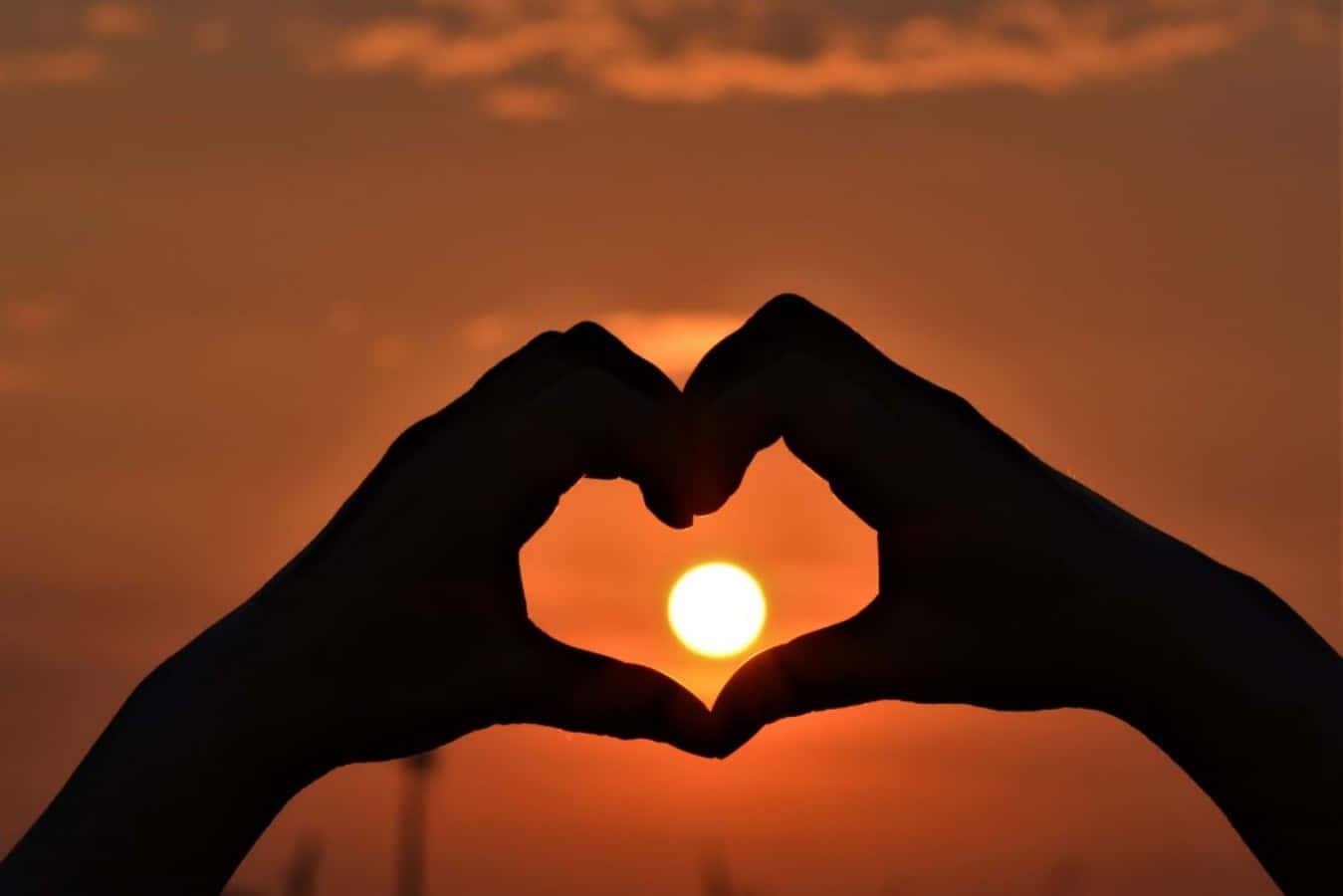 Heart Silhouette On A Blurred Background Wallpaper