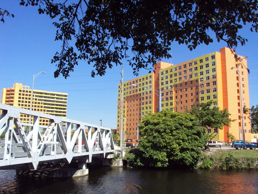 Hialeah Canal Bridgeand Colorful Buildings Wallpaper