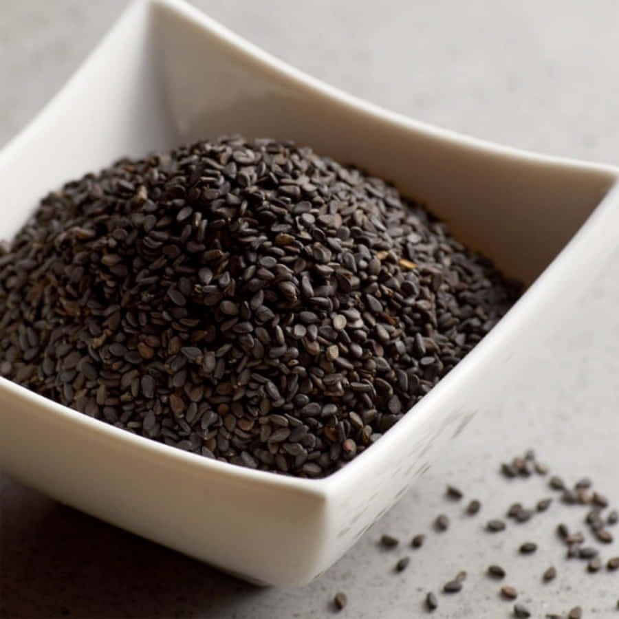 Highlighting Its Color And Texture, This Close Up Of Black Sesame Seeds Is Sure To Turn Heads! Wallpaper