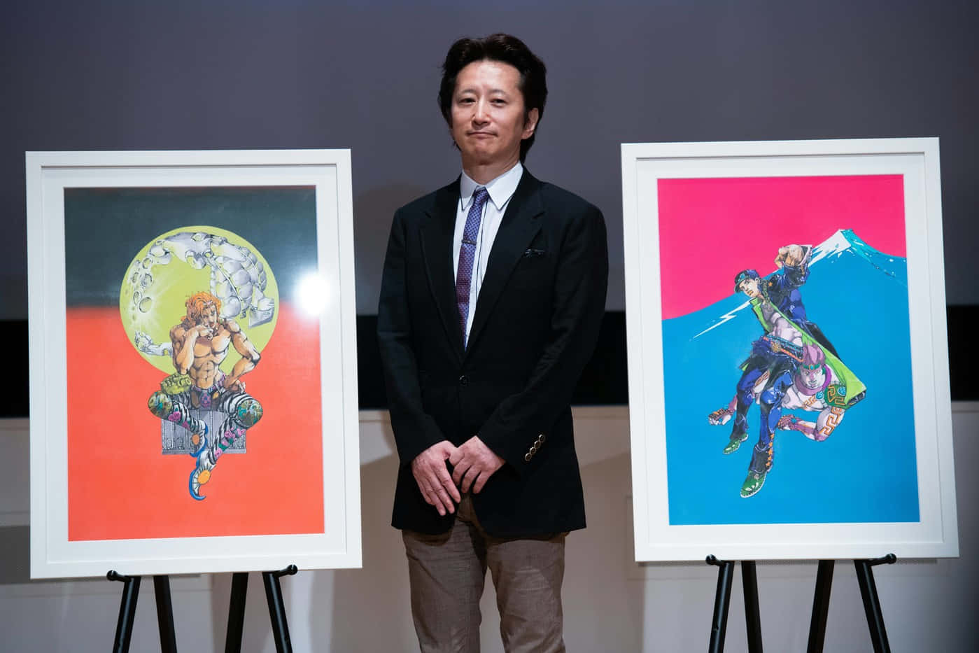 Hirohiko Araki, Creator Of Jojo's Bizarre Adventure, Showcasing His Artwork Wallpaper