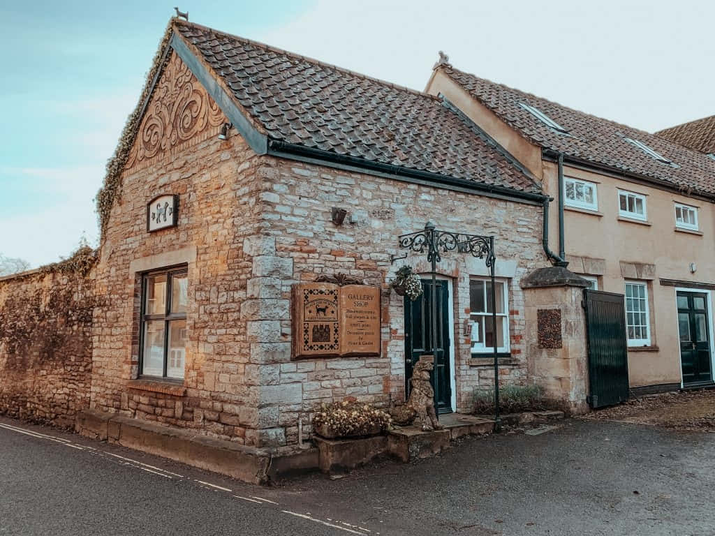 Historic Stone Building Wells U K Wallpaper