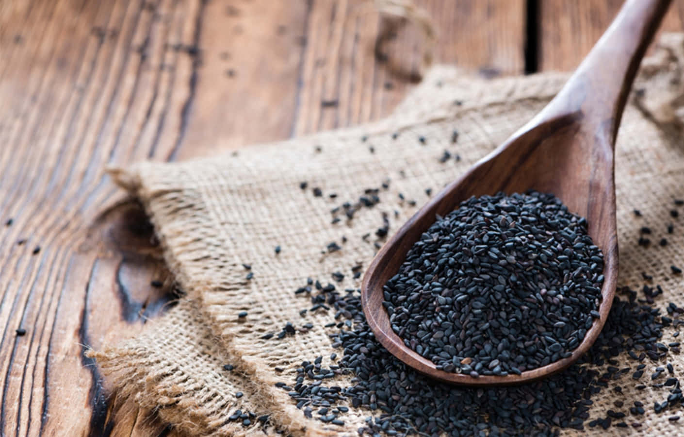 Historically Connected To Eastern Cultures, This Close-up Of Black Sesame In A Bowl Is A Reminder Of Our Roots. Wallpaper