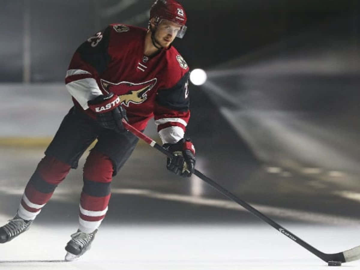 Hockey Star Oliver Ekman-larsson In Action On The Ice Wallpaper