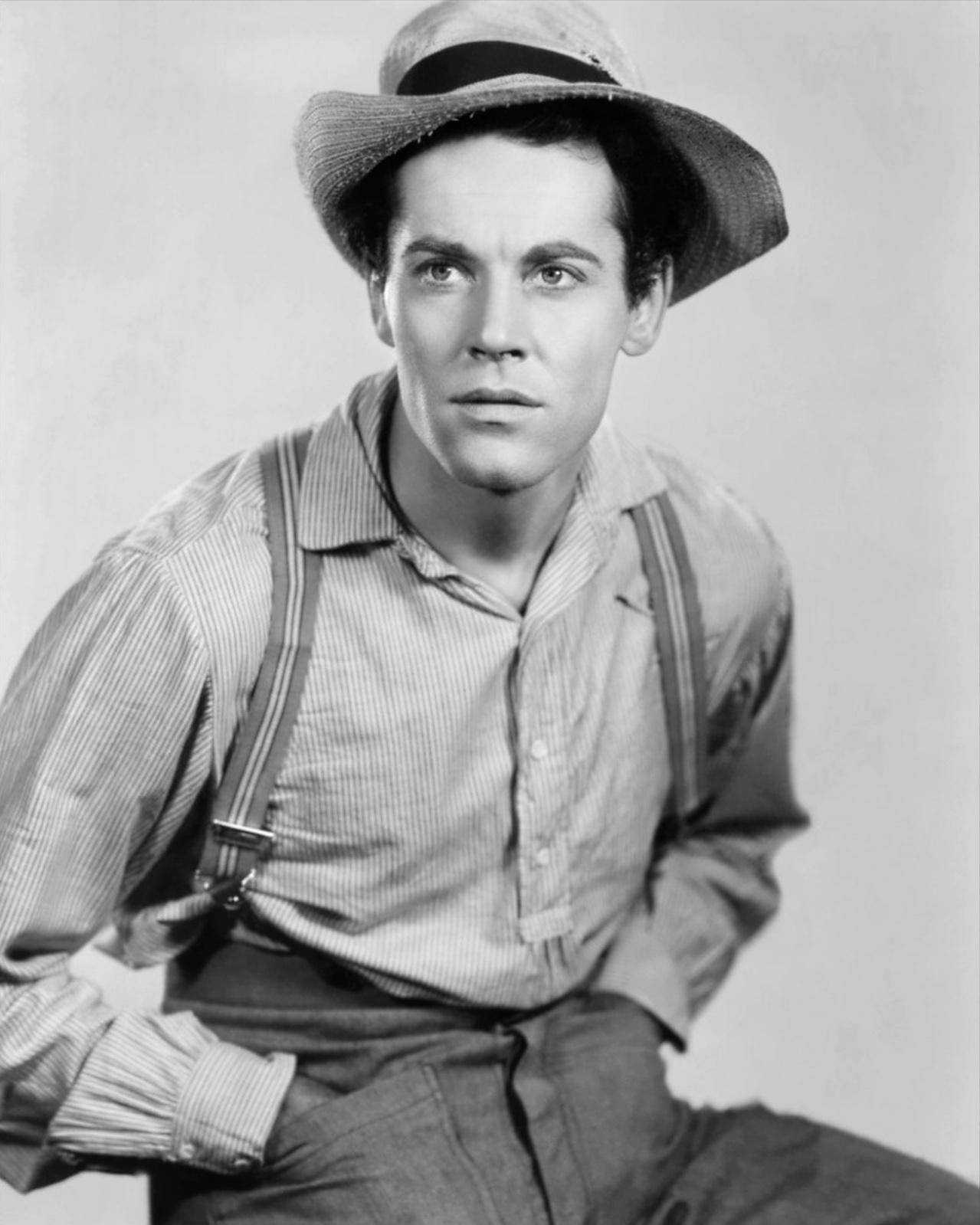 Hollywood Actor Henry Fonda In Classic Farming Attire Wallpaper