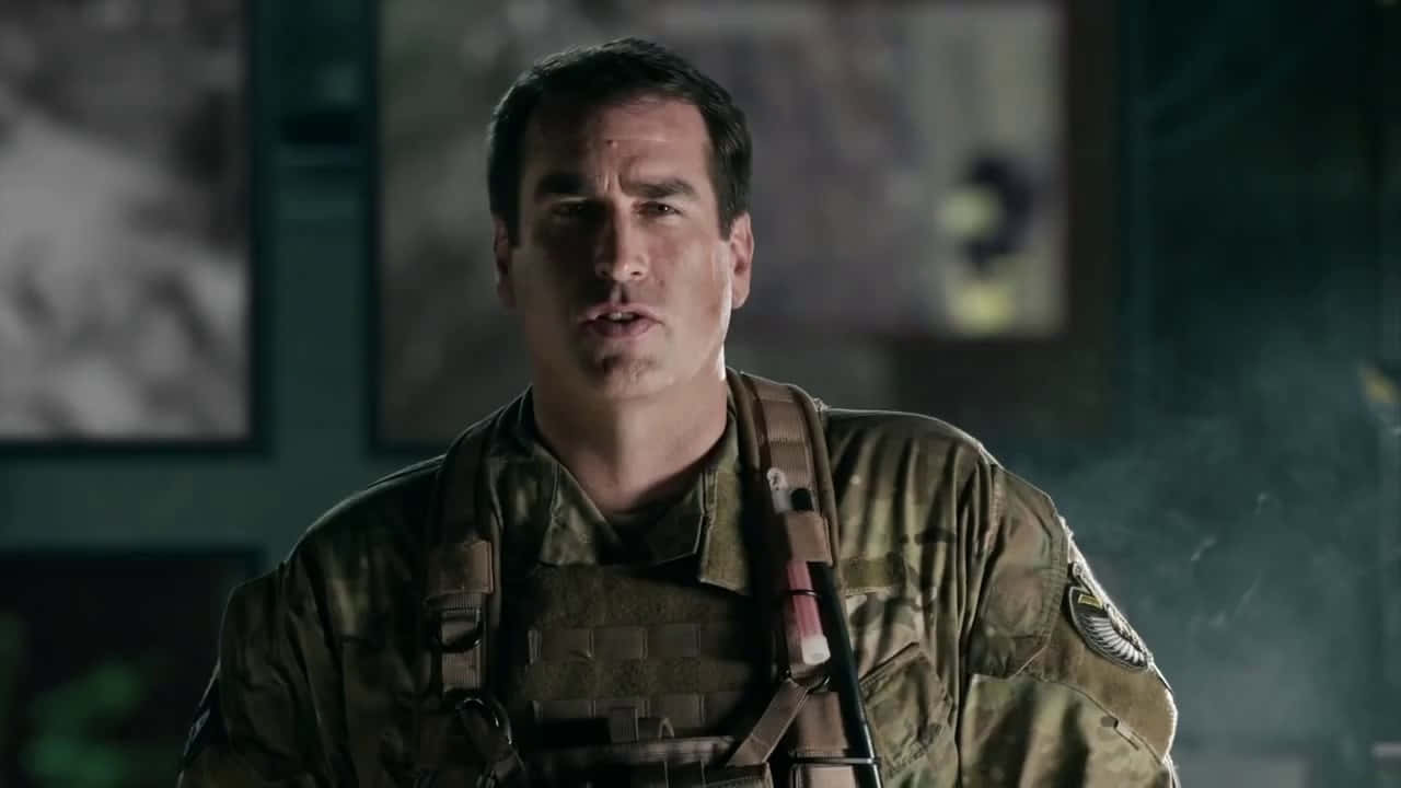 Hollywood Actor Rob Riggle Captured In A Candid Moment Wallpaper