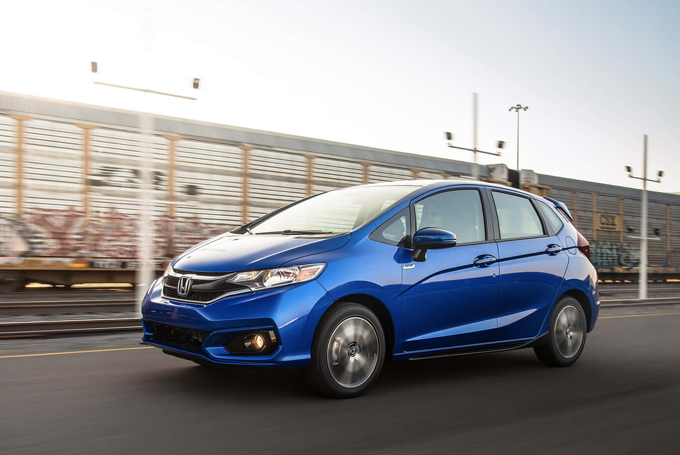 Honda Fit Parked In An Urban Setting Wallpaper