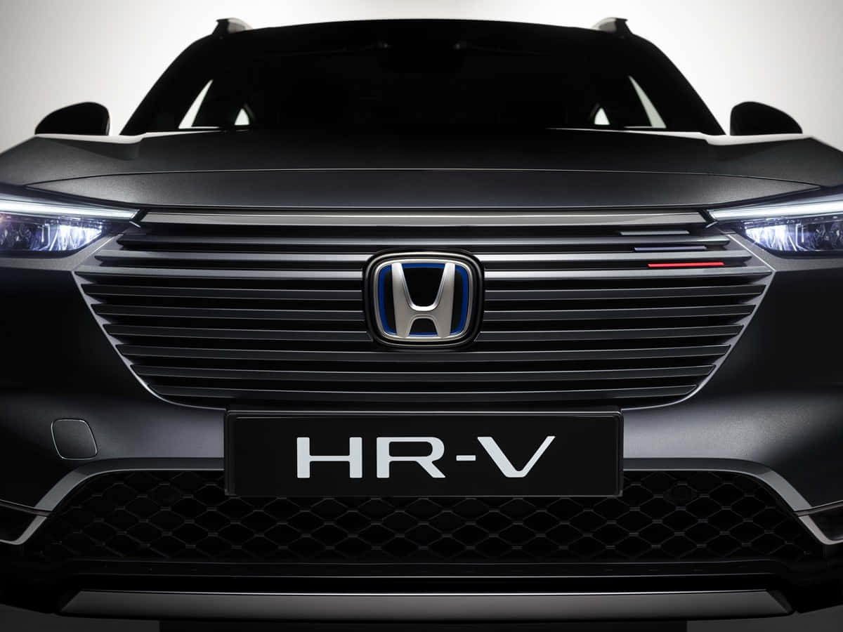 Honda Hr-v Driving In A Scenic Route Wallpaper