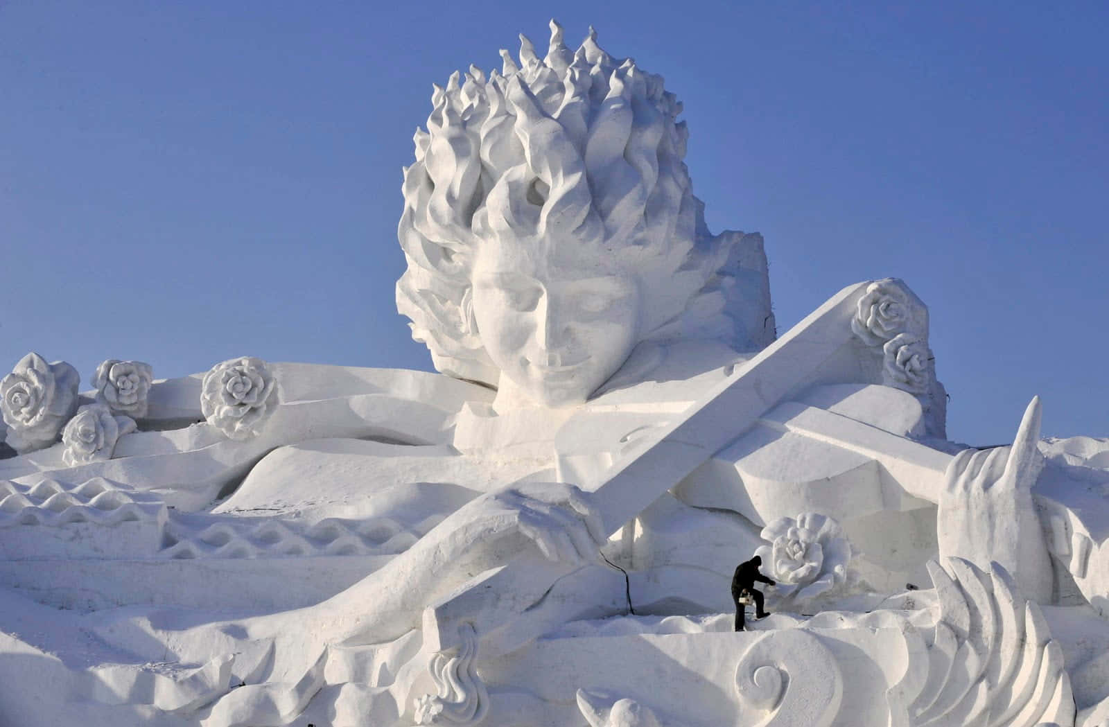 Ice Sculpture Of A Magical Winter Scene Wallpaper