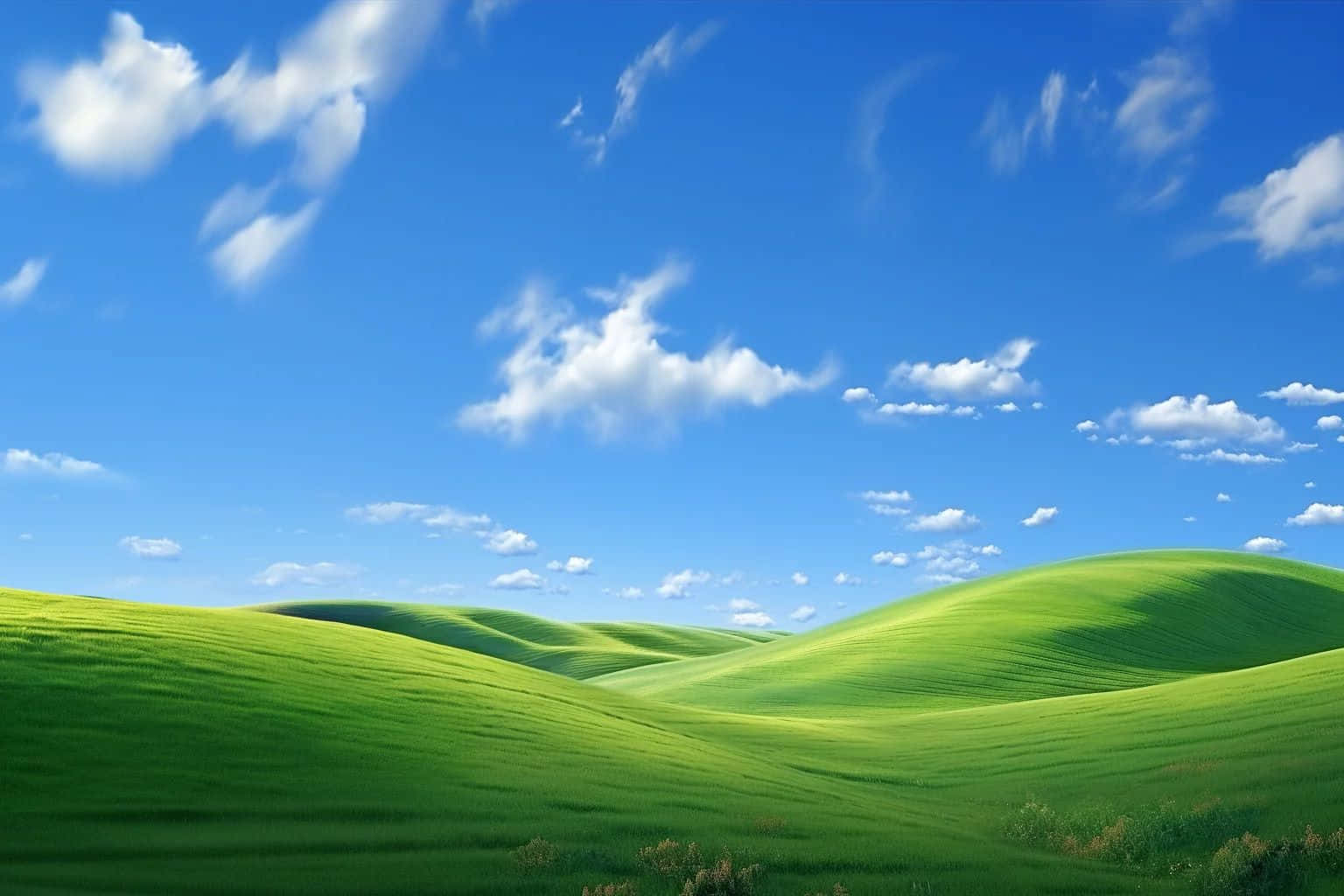 Iconic_ Green_ Hills_and_ Blue_ Sky Wallpaper