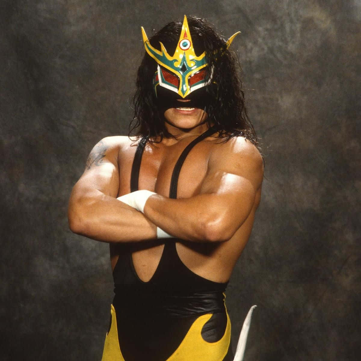 Iconic Luchador Juventud Guerrera Showcasing His Signature Mask Wallpaper