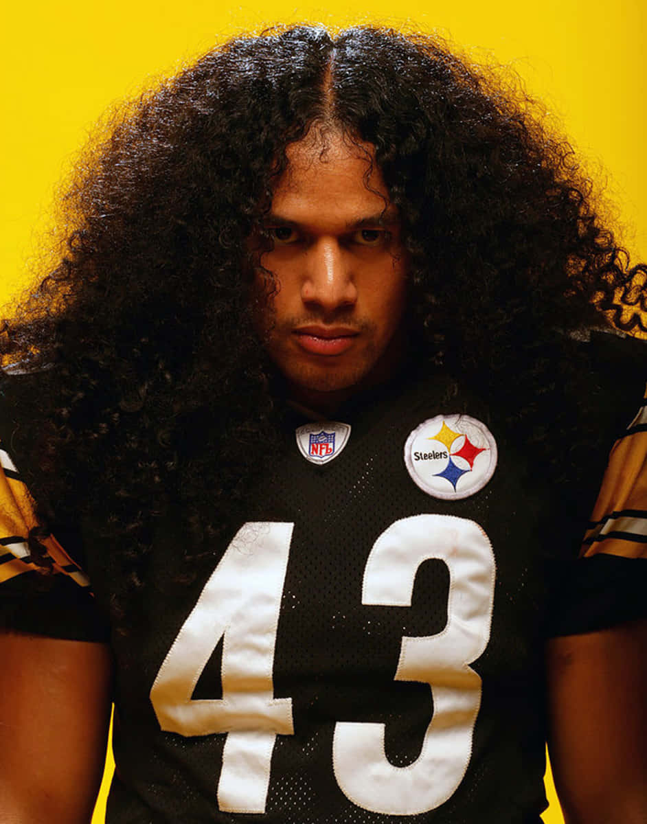 Iconic Nfl Safety Troy Polamalu Wallpaper