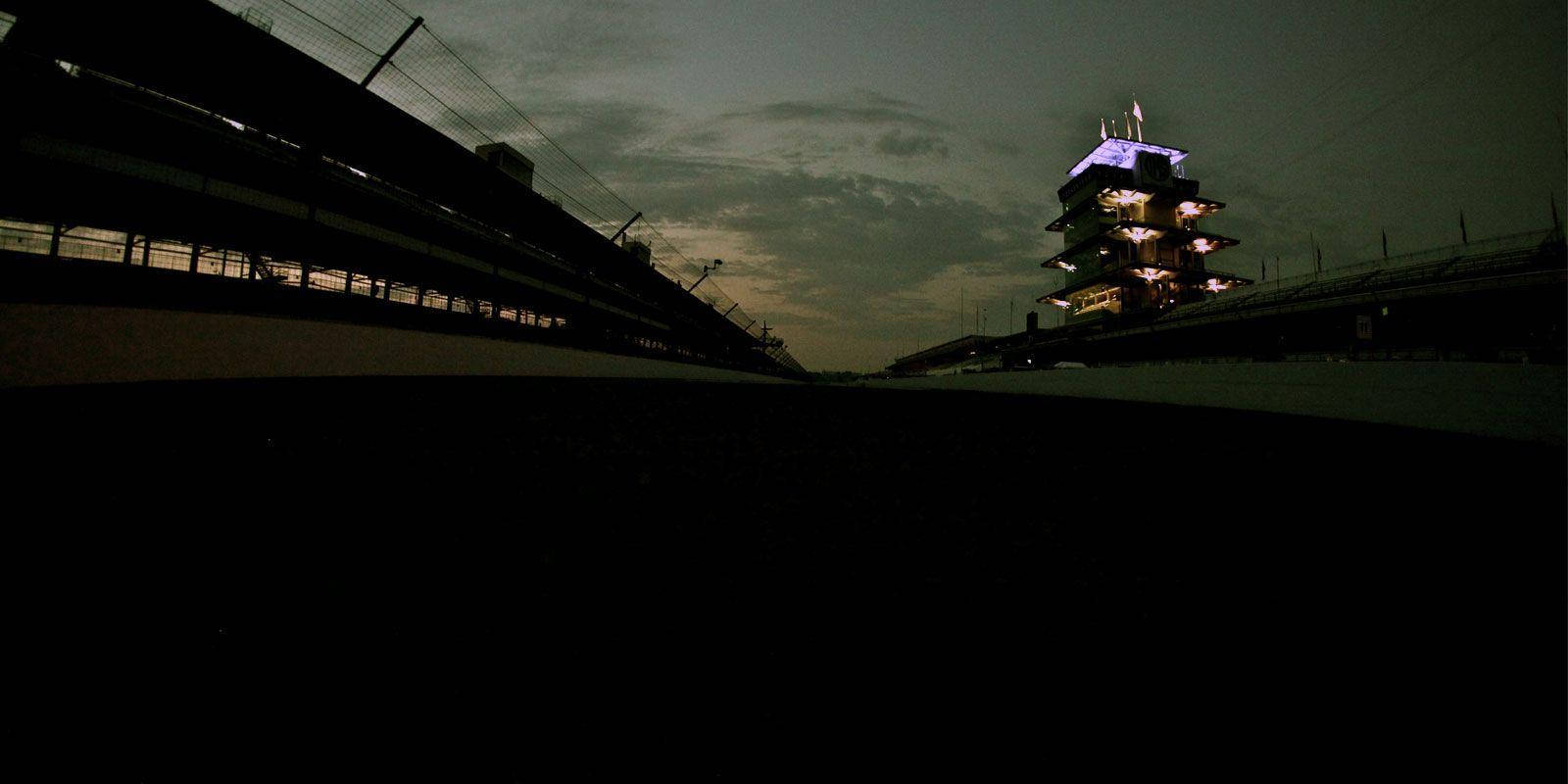 Illuminated Night At The Indianapolis 500 Motor Speedway Wallpaper