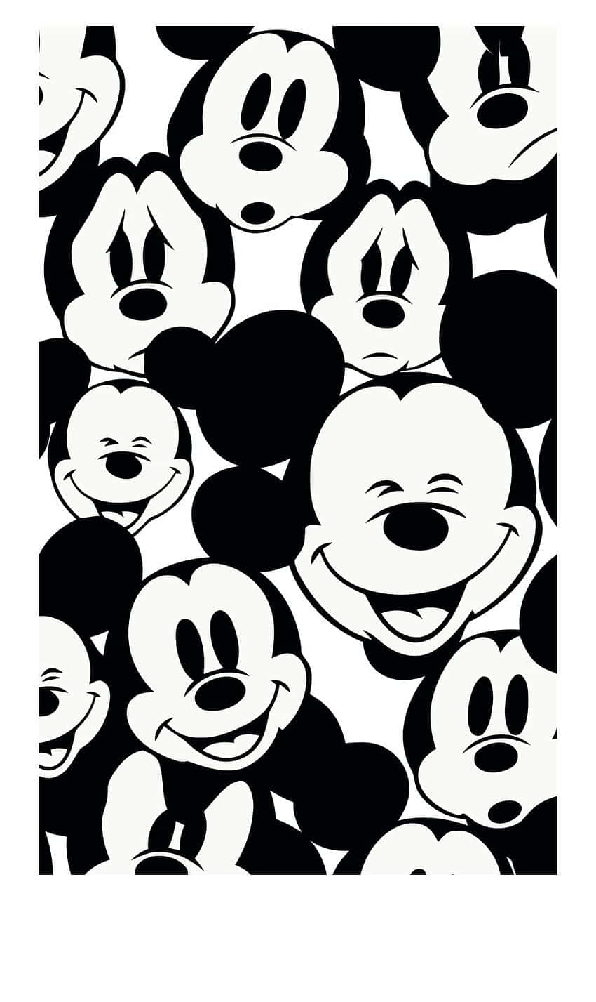 Image A Black Electronic Device With A Design Of The Iconic Disney Character, Mickey Mouse. Wallpaper