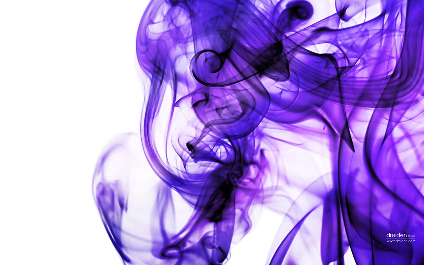 Image Brightly Colored Smoke In A Dark Setting Wallpaper