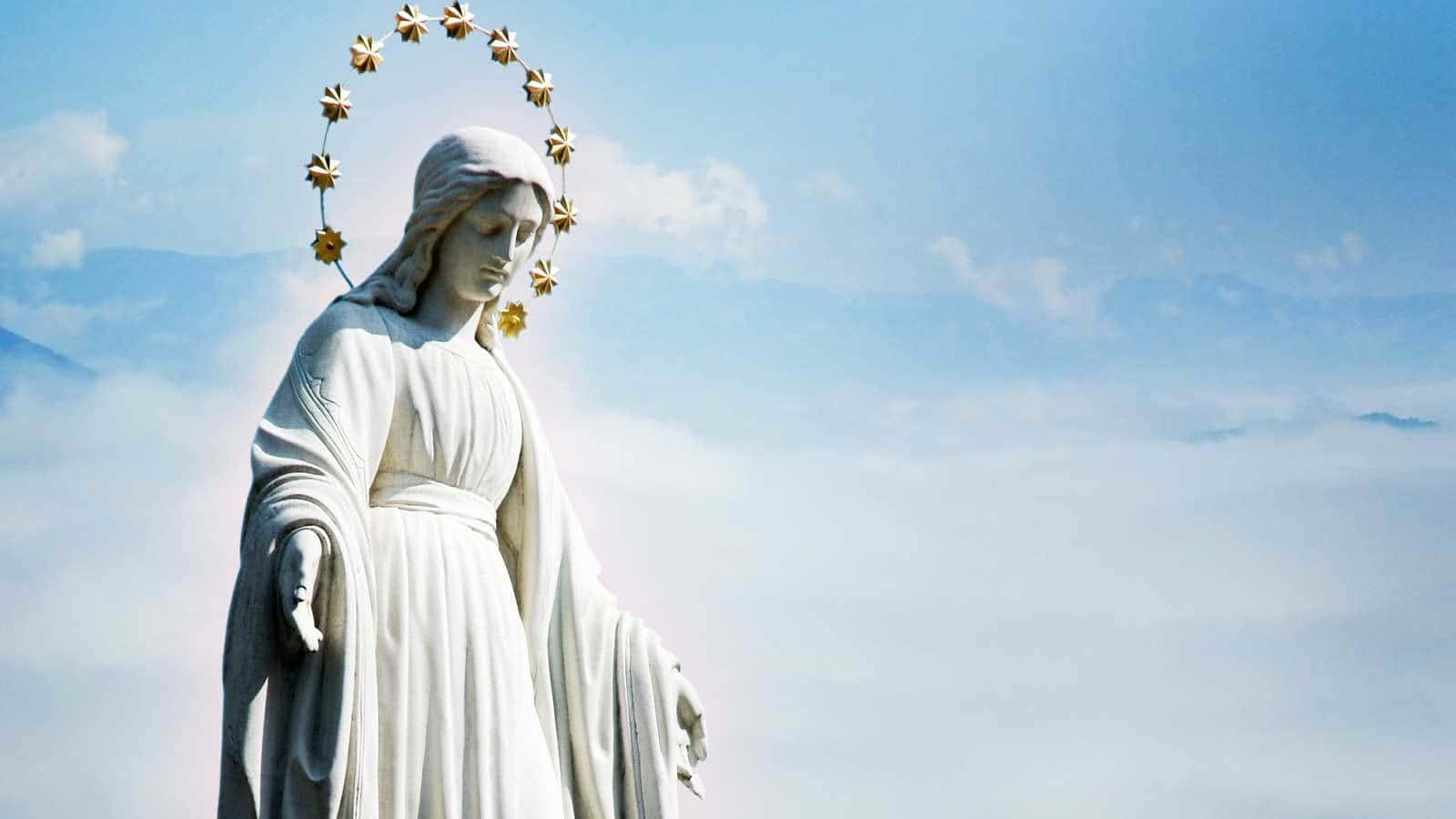 Immaculate Conception Statue Sky Backdrop Wallpaper