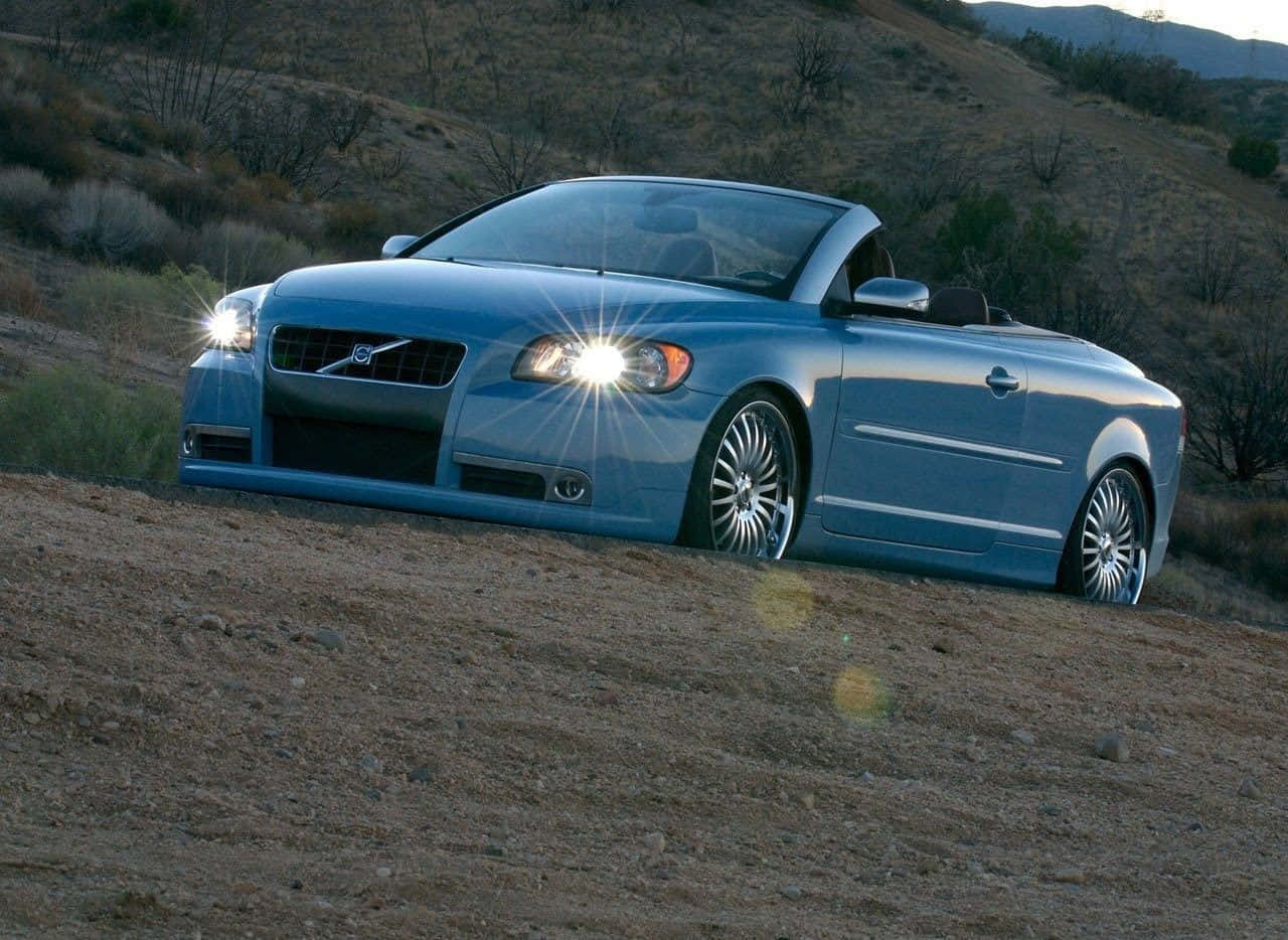 Impeccable Volvo C70 In Chic White Wallpaper