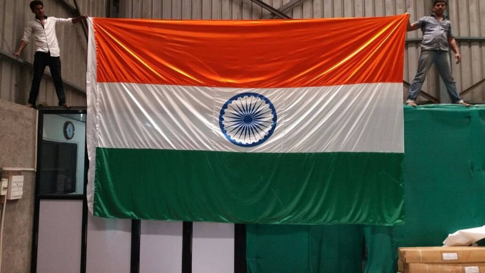 Indian Flag With Two Men Holding Wallpaper